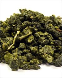 oolong Тэ Гуанинь, имеет нежный светлый желтовато-зеленоватый или медовый оттенок настоя. Своим видом они ближе к зелёным чаям, а вкусом - к красным. 